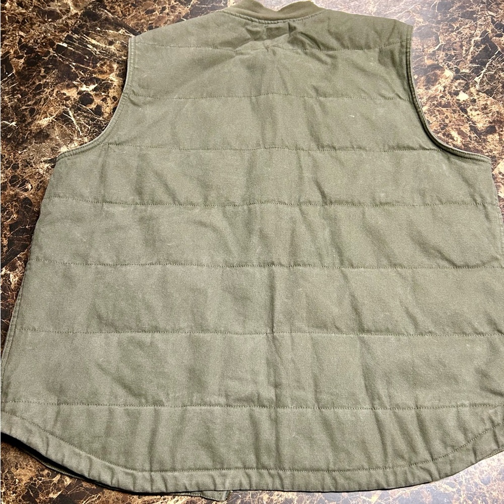 Men’s Wrangler “workwear” vest. Army green in color and has 4 pockets.